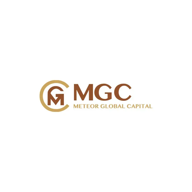 MGC Meteor Global Capital gold monogram in a bronze ring