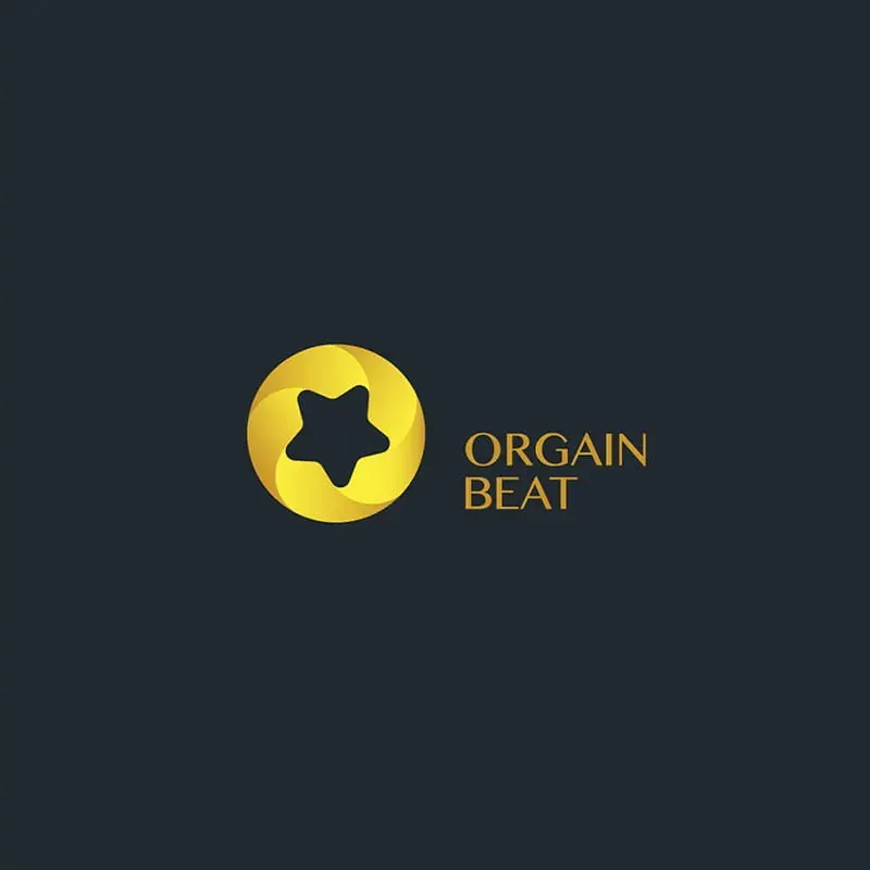 Orgain Beat gold emblem — star knocked out of a swirled coin on navy
