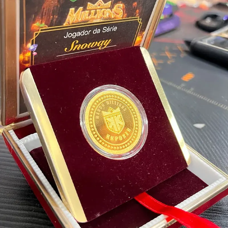 The real 24-carat gold coin in its presentation box with certificate
